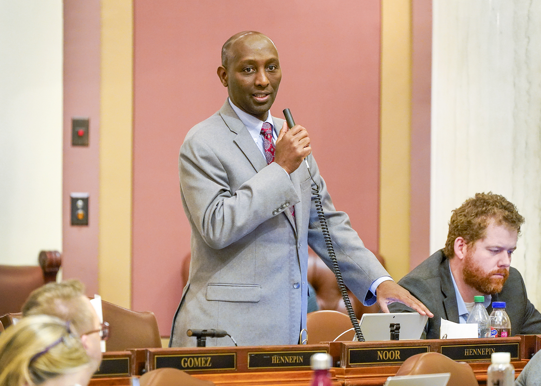 Rep. Mohamud Noor presents the human services finance bill on the House Floor May 19. (Photo by Andrew VonBank)